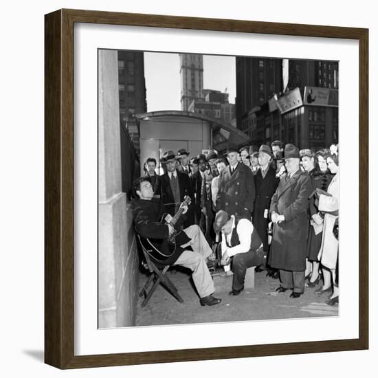 Activist Folk Musician Woody Guthrie Playing for a Crowd of New Yorkers-null-Framed Premium Photographic Print