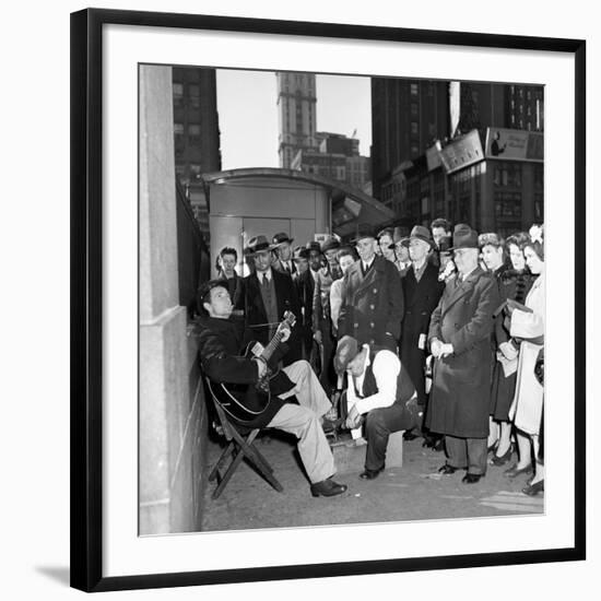 Activist Folk Musician Woody Guthrie Playing for a Crowd of New Yorkers-null-Framed Premium Photographic Print