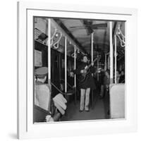 Activist Folk Musician Woody Guthrie Playing for a Subway Car of New Yorkers-Eric Schaal-Framed Premium Photographic Print