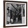 Activist Folk Musician Woody Guthrie Playing for a Subway Car of New Yorkers-Eric Schaal-Framed Premium Photographic Print