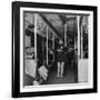 Activist Folk Musician Woody Guthrie Playing for a Subway Car of New Yorkers-Eric Schaal-Framed Premium Photographic Print