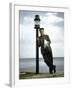 Actor Art Carney Leaning Against a Lamp Post-Leonard Mccombe-Framed Premium Photographic Print