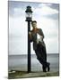 Actor Art Carney Leaning Against a Lamp Post-Leonard Mccombe-Mounted Premium Photographic Print
