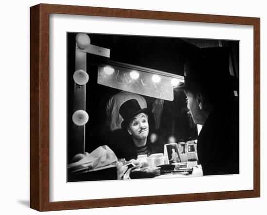 Actor Charlie Chaplin Looking Putting on Makeup for Role as Animal Trainer in Film "Limelight"-W^ Eugene Smith-Framed Premium Photographic Print