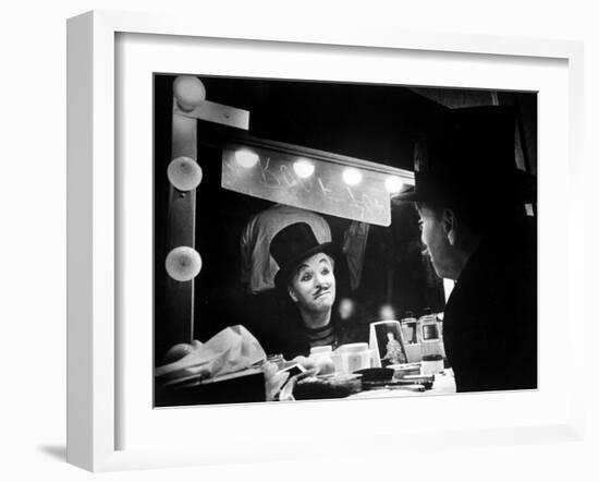 Actor Charlie Chaplin Looking Putting on Makeup for Role as Animal Trainer in Film "Limelight"-W^ Eugene Smith-Framed Premium Photographic Print