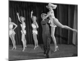 Actor Clowning around with Dancing Girls During the Nightlife in Las Vegas-Loomis Dean-Mounted Premium Photographic Print