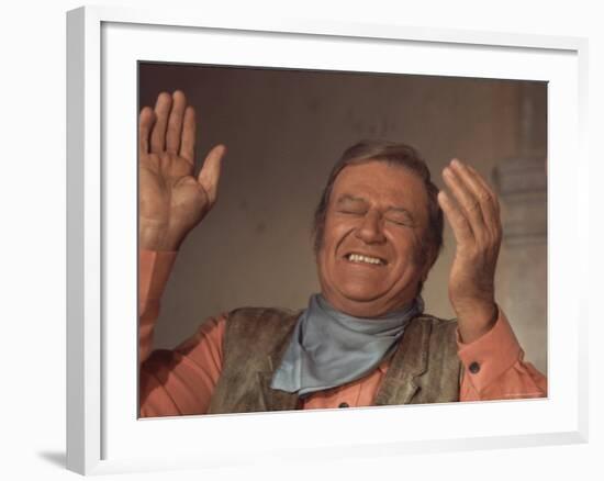 Actor John Wayne During Filming of Western Movie "The Undefeated"-John Dominis-Framed Premium Photographic Print