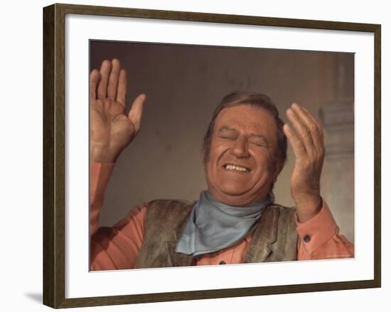 Actor John Wayne During Filming of Western Movie "The Undefeated"-John Dominis-Framed Premium Photographic Print