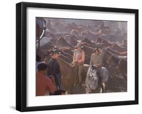 Actor John Wayne During Filming of Western Movie "The Undefeated"-John Dominis-Framed Premium Photographic Print