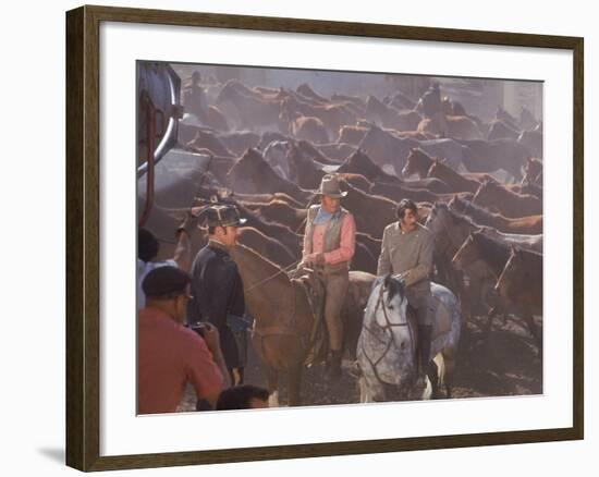 Actor John Wayne During Filming of Western Movie "The Undefeated"-John Dominis-Framed Premium Photographic Print