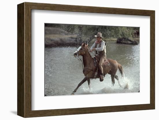 Actor John Wayne During Filming of Western Movie "The Undefeated"-John Dominis-Framed Photographic Print