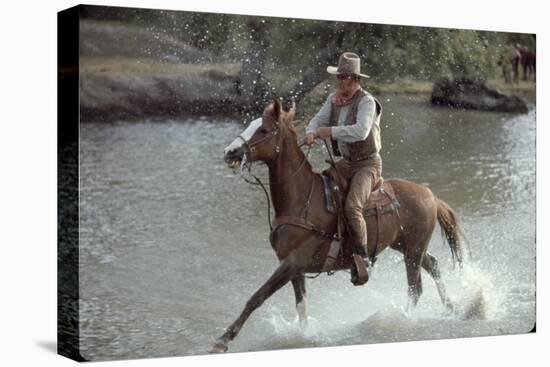 Actor John Wayne During Filming of Western Movie "The Undefeated"-John Dominis-Stretched Canvas