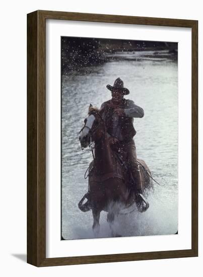 Actor John Wayne During Filming of Western Movie "The Undefeated"-John Dominis-Framed Photographic Print