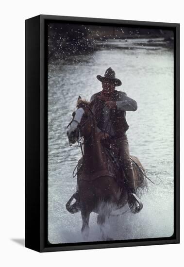 Actor John Wayne During Filming of Western Movie "The Undefeated"-John Dominis-Framed Stretched Canvas