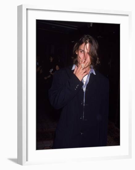 Actor Johnny Depp Smoking a Cigarette-null-Framed Premium Photographic Print