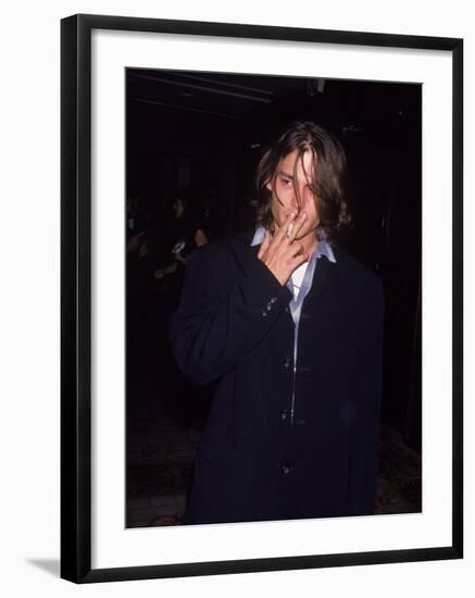 Actor Johnny Depp Smoking a Cigarette-null-Framed Premium Photographic Print