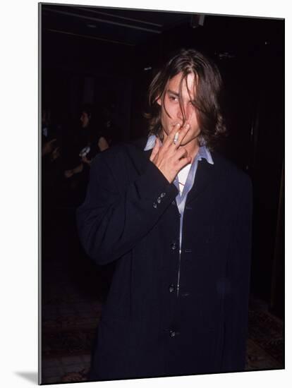 Actor Johnny Depp Smoking a Cigarette-null-Mounted Premium Photographic Print