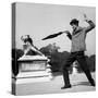 Actor Jose Pantieri Clowning around in Tuileries Gardens, Paris, 1962-null-Stretched Canvas