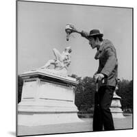 Actor Jose Pantieri Clowning around in Tuileries Gardens, Paris, 1962-null-Mounted Photo