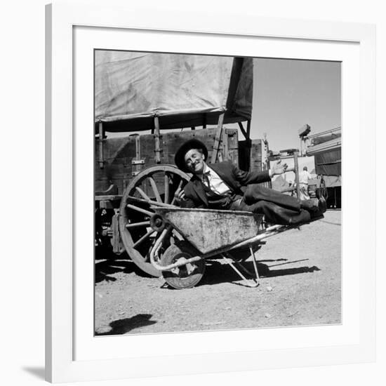 Actor Kirk Douglas Clowning on the Set of the Western Action Film "Gunfight at O.K. Corral"-Ralph Crane-Framed Premium Photographic Print