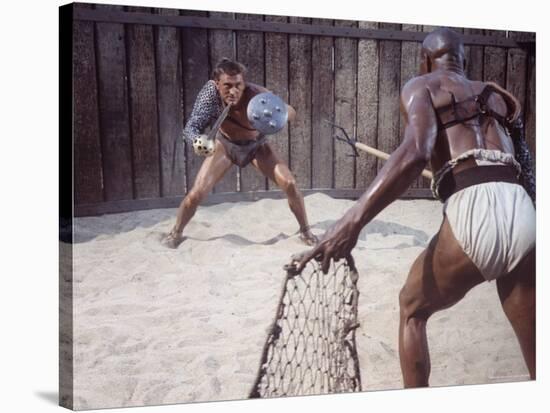 Actor Kirk Douglas Faces Actor Woody Strode in Scene From Stanley Kubrick's Film "Spartacus"-J^ R^ Eyerman-Stretched Canvas