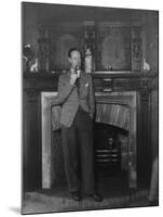 Actor Leslie Howard Smoking Pipe as He Stands by His Fireplace, at Home in Dorking, England-null-Mounted Premium Photographic Print