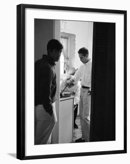 Actor Paul Newman Cooking Eggs for Guests Incl. Anthony Perkins During an Informal Party-null-Framed Premium Photographic Print