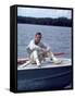 Actor Paul Newman Enjoying a Heineken Beer on the Prow of a Boat-Mark Kauffman-Framed Stretched Canvas