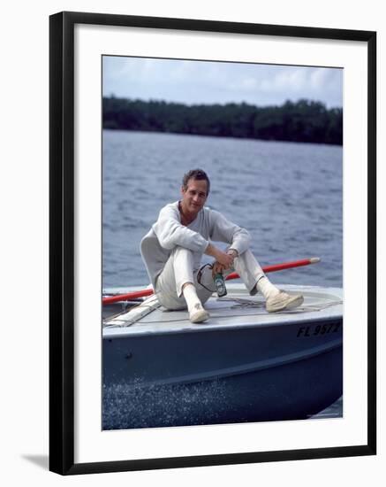 Actor Paul Newman Enjoying a Heineken Beer on the Prow of a Boat-Mark Kauffman-Framed Premium Photographic Print