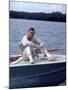 Actor Paul Newman Enjoying a Heineken Beer on the Prow of a Boat-Mark Kauffman-Mounted Premium Photographic Print