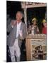 Actor Paul Newman Standing Next to a Stand Sell Newman's Own Virgin Lemonade-null-Mounted Premium Photographic Print
