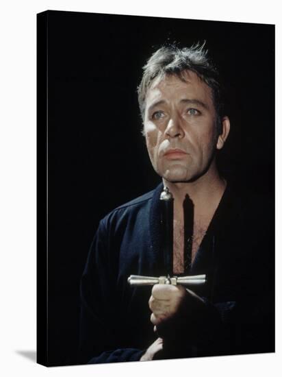 Actor Richard Burton Gripping Hilt of Sword During Scene from "Hamlet" on Broadway-George Silk-Stretched Canvas