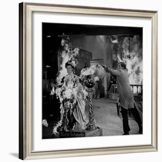 Actor Vincent Price Putting Out Fire in Film "House of Wax"-J^ R^ Eyerman-Framed Premium Photographic Print