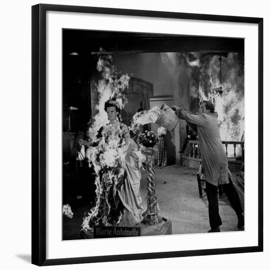 Actor Vincent Price Putting Out Fire in Film "House of Wax"-J^ R^ Eyerman-Framed Premium Photographic Print