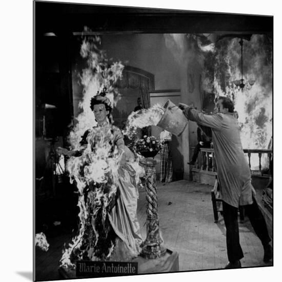 Actor Vincent Price Putting Out Fire in Film "House of Wax"-J^ R^ Eyerman-Mounted Premium Photographic Print