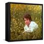 Actor Warren Beatty Sitting in Field of Flowers-Ralph Crane-Framed Stretched Canvas