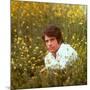 Actor Warren Beatty Sitting in Field of Flowers-Ralph Crane-Mounted Premium Photographic Print