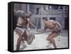 Actor Woody Strode Squaring Off Against Actor Kirk Douglas in Gladiator Battle in "Spartacus"-J^ R^ Eyerman-Framed Stretched Canvas