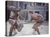 Actor Woody Strode Squaring Off Against Actor Kirk Douglas in Gladiator Battle in "Spartacus"-J^ R^ Eyerman-Stretched Canvas