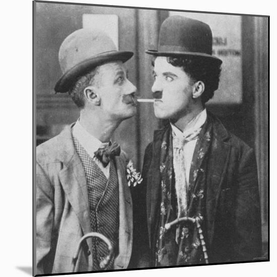 Actors Charlie Chaplin and Ben Turpin in Film His New Job-null-Mounted Premium Photographic Print