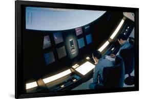 Actors Keir Dullea and Gray Lockwood Sitting at Console in Scene of "2001: A Space Odyssey"-Dmitri Kessel-Framed Photographic Print