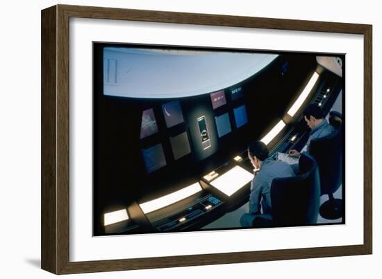 Actors Keir Dullea and Gray Lockwood Sitting at Console in Scene of "2001: A Space Odyssey"-Dmitri Kessel-Framed Photographic Print