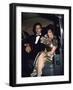 Actors Michael Nader and Joan Collins Sitting in a Car-John Paschal-Framed Premium Photographic Print