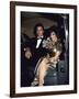 Actors Michael Nader and Joan Collins Sitting in a Car-John Paschal-Framed Premium Photographic Print