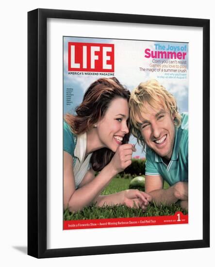 Actors Rachel McAdams and Owen Wilson Outdoors Lying on Lawn, July 1, 2005-Karina Taira-Framed Photographic Print