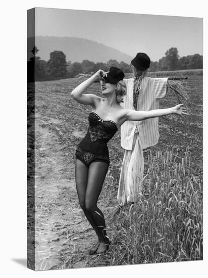 Actress and Dancer Julie Newmar Warming Up for Her Devil's Role in the Musical "Damn Yankees"-Nina Leen-Stretched Canvas