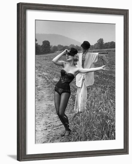 Actress and Dancer Julie Newmar Warming Up for Her Devil's Role in the Musical "Damn Yankees"-Nina Leen-Framed Premium Photographic Print
