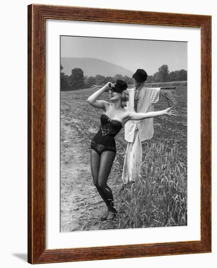 Actress and Dancer Julie Newmar Warming Up for Her Devil's Role in the Musical "Damn Yankees"-Nina Leen-Framed Premium Photographic Print