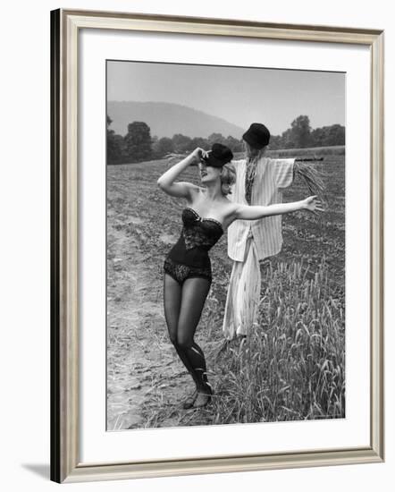 Actress and Dancer Julie Newmar Warming Up for Her Devil's Role in the Musical "Damn Yankees"-Nina Leen-Framed Premium Photographic Print