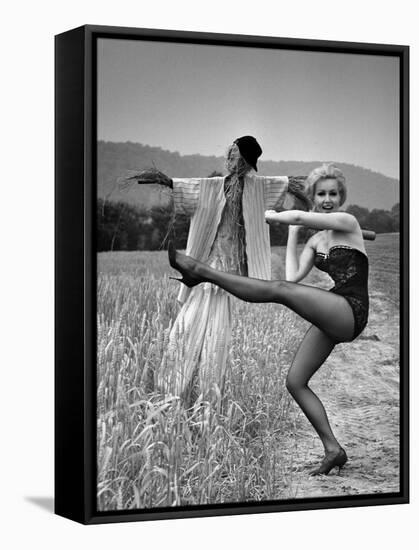 Actress and Dancer Julie Newmar Warming Up for Her Devil's Role in the Musical "Damn Yankees"-Nina Leen-Framed Stretched Canvas